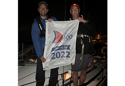 Brian and Martin Rutter with flag 400